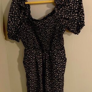Floral jumpsuit with pockets and ribbed waist area